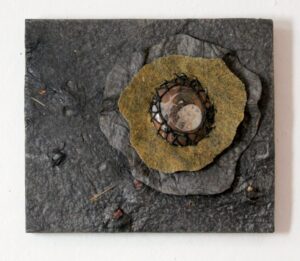 Rebirth cast handmade paper on driveway, felt, ammonite stone, wax linen 6"h x 7"w SOLD
